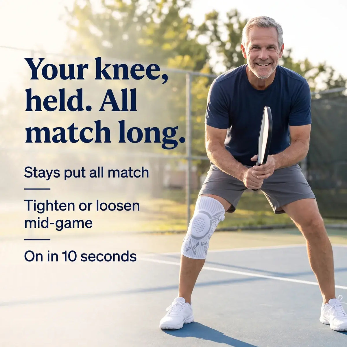 Pickleball player wearing the Reoviva dial knee brace on an outdoor court