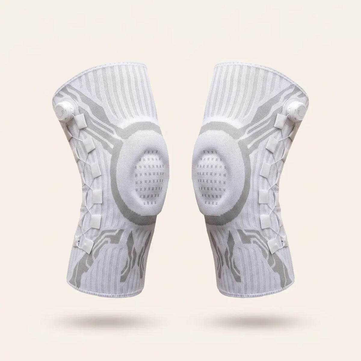 Left and right Reoviva dial knee braces, pair, dial on the outer side of each knee