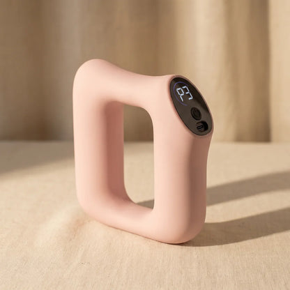 Reoviva Pro hands-free vibration massager in Blush Pink